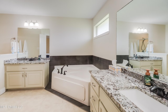 2901 Village Cir, Ocean Springs, MS 39564 - full bathroom with a bath, two vanities, tile patterned floors, and a shower
