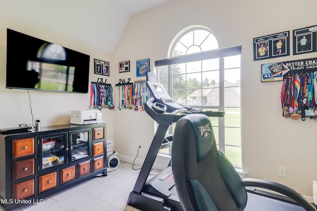 2901 Village Cir, Ocean Springs, MS 39564 - workout area with vaulted ceiling and light tile patterned floors