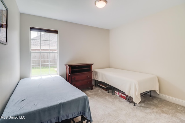 2901 Village Cir, Ocean Springs, MS 39564 - carpeted bedroom featuring multiple windows