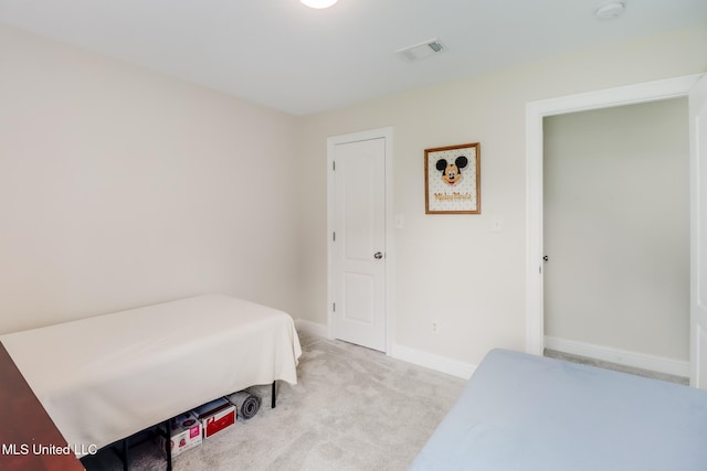 2901 Village Cir, Ocean Springs, MS 39564 - bedroom featuring light carpet and baseboards