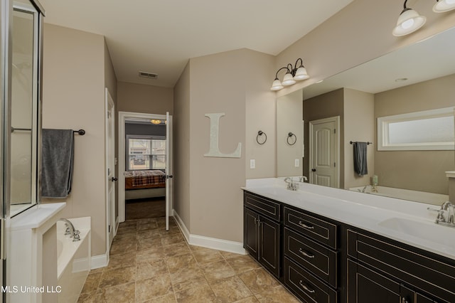 bathroom featuring vanity and a bathing tub