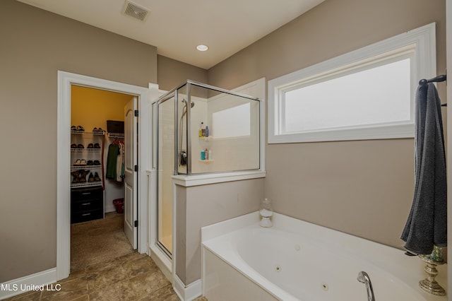 bathroom with independent shower and bath