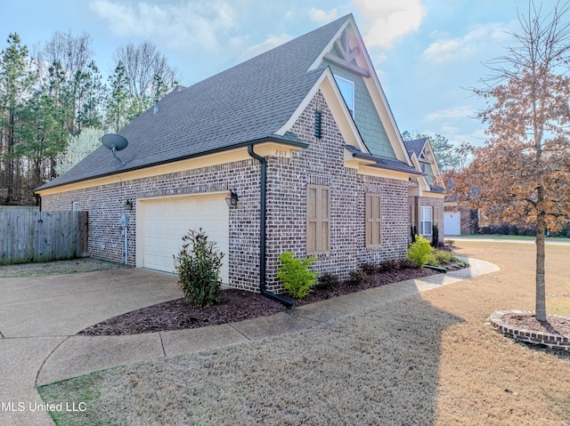 view of property exterior with a garage