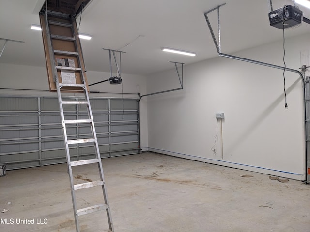 garage featuring a garage door opener