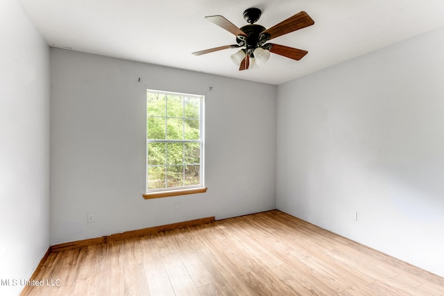 unfurnished room with ceiling fan and light hardwood / wood-style flooring