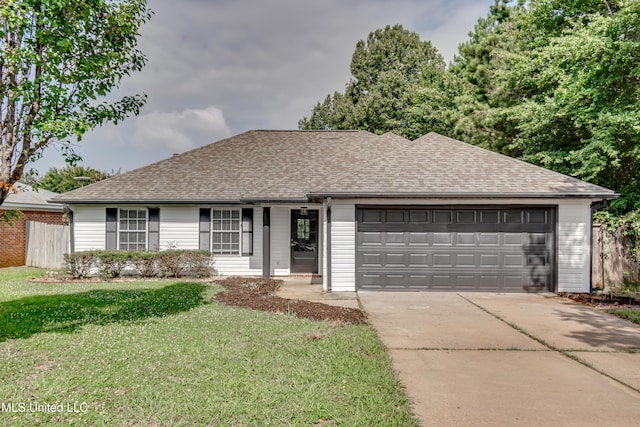 783 Whippoorwill Dr, Brandon, MS 39047 - ranch-style house with concrete driveway, a garage, and a shingled roof