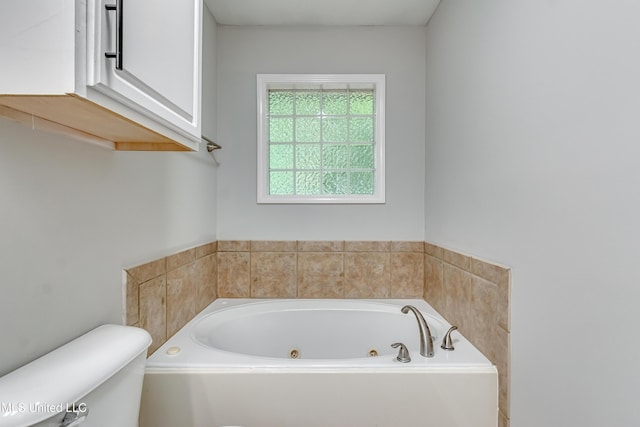 783 Whippoorwill Dr, Brandon, MS 39047 - full bathroom featuring a jetted tub and toilet
