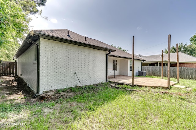 783 Whippoorwill Dr, Brandon, MS 39047 - back of house with a fenced backyard, a patio area, and brick siding