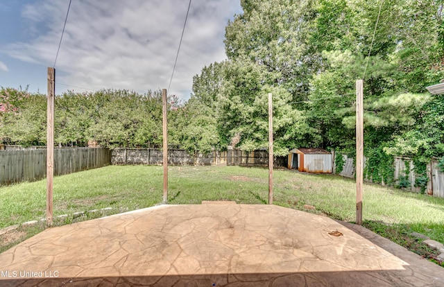 783 Whippoorwill Dr, Brandon, MS 39047 - fenced backyard featuring a storage shed and a patio area