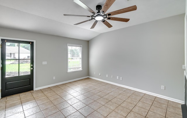 783 Whippoorwill Dr, Brandon, MS 39047 - spare room featuring light tile patterned floors, ceiling fan, and lofted ceiling