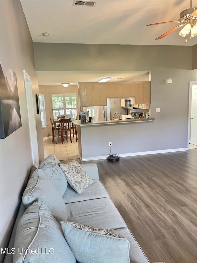 8617 Pinoak Ln, Ocean Springs, MS 39564 - living room featuring wood finished floors and ceiling fan