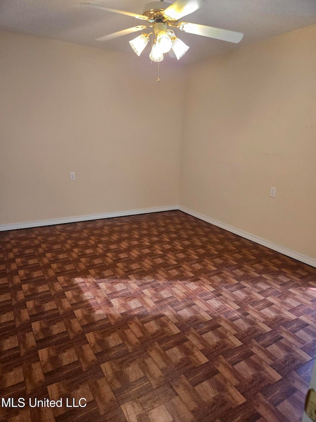 empty room featuring ceiling fan