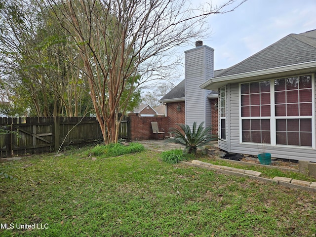 view of yard with a patio area