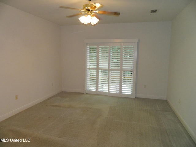 7890 Hilo Way, Diamondhead, MS 39525 - unfurnished room with a ceiling fan, light carpet, and baseboards