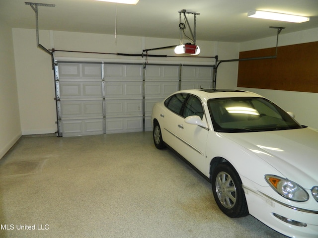 7890 Hilo Way, Diamondhead, MS 39525 - garage featuring a garage door opener