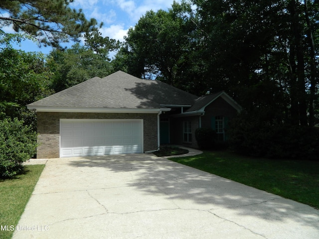 7890 Hilo Way, Diamondhead, MS 39525 - single story home with concrete driveway, brick siding, a garage, and roof with shingles