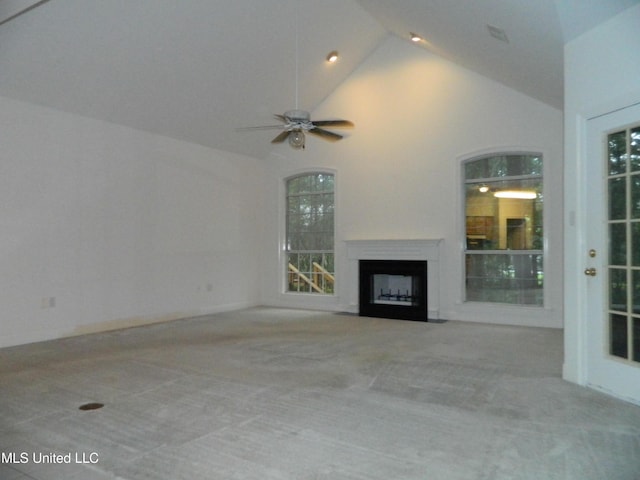 7890 Hilo Way, Diamondhead, MS 39525 - unfurnished living room with a fireplace with flush hearth, carpet, a ceiling fan, and high vaulted ceiling