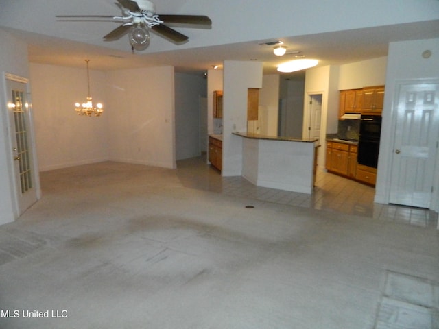7890 Hilo Way, Diamondhead, MS 39525 - unfurnished living room featuring ceiling fan, a chandelier, and light tile patterned floors