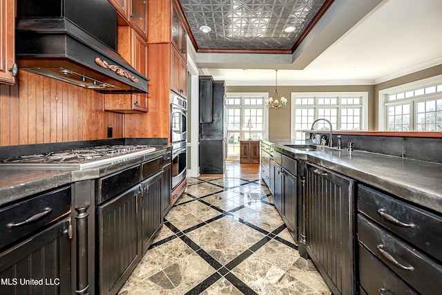 1401 Ladnier Rd, Gautier, MS 39553 - kitchen featuring a sink, ornamental molding, a healthy amount of sunlight, and ventilation hood