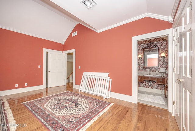 1401 Ladnier Rd, Gautier, MS 39553 - foyer with visible vents, vaulted ceiling, and light wood-type flooring