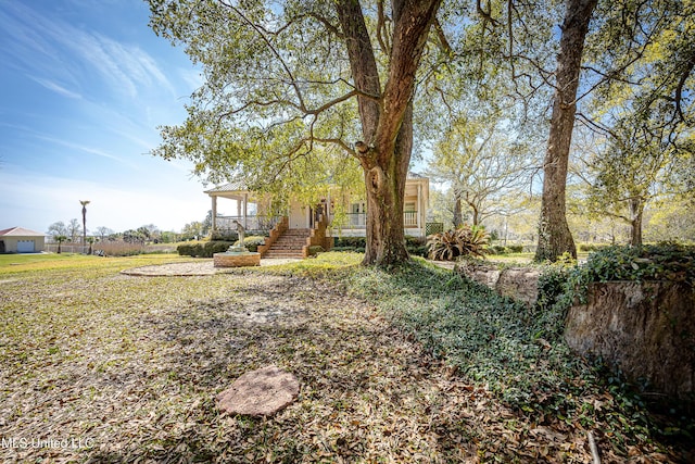 1401 Ladnier Rd, Gautier, MS 39553 - view of yard with covered porch