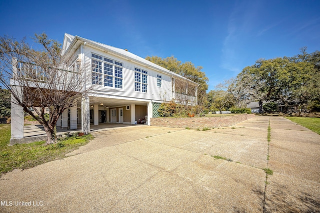 1401 Ladnier Rd, Gautier, MS 39553 - view of front of home featuring driveway and a carport