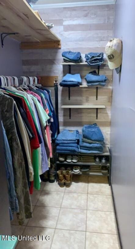 spacious closet featuring tile patterned floors