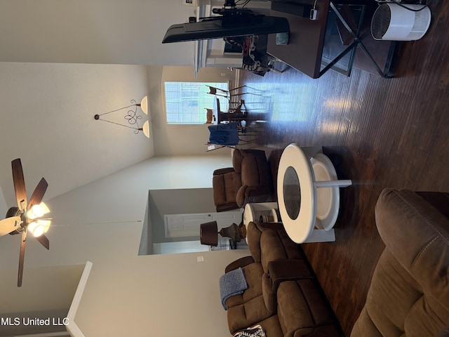living room with a ceiling fan