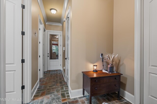 10 Magnolia Crossing Rd, Sumrall, MS 39482 - hallway with baseboards, stone tile floors, and ornamental molding