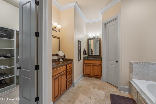 10 Magnolia Crossing Rd, Sumrall, MS 39482 - bathroom featuring vanity, baseboards, a bath, crown molding, and a walk in closet