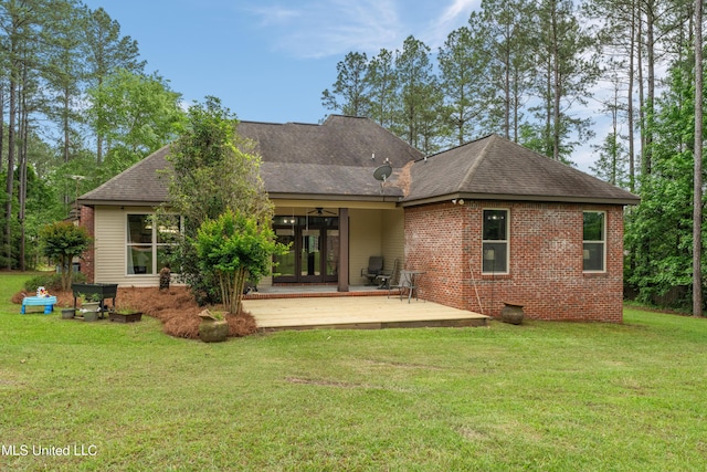 10 Magnolia Crossing Rd, Sumrall, MS 39482 - back of house featuring a lawn, a wooden deck, french doors, and ceiling fan