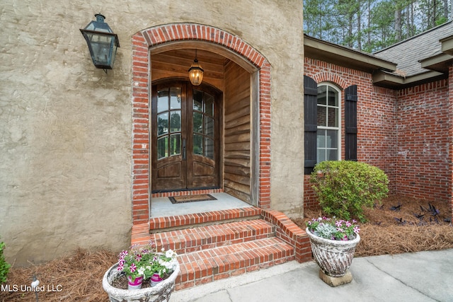 10 Magnolia Crossing Rd, Sumrall, MS 39482 - doorway to property featuring french doors and brick siding
