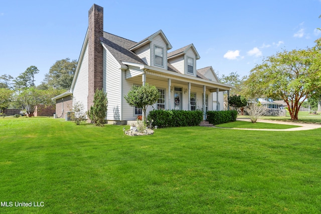 cape cod home featuring a front lawn and a porch