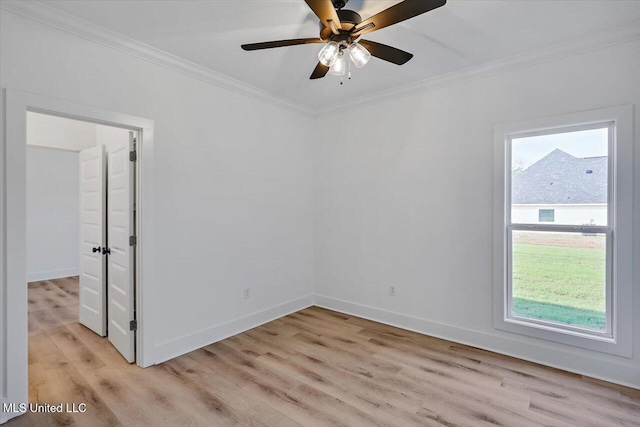 unfurnished room with light hardwood / wood-style floors and crown molding