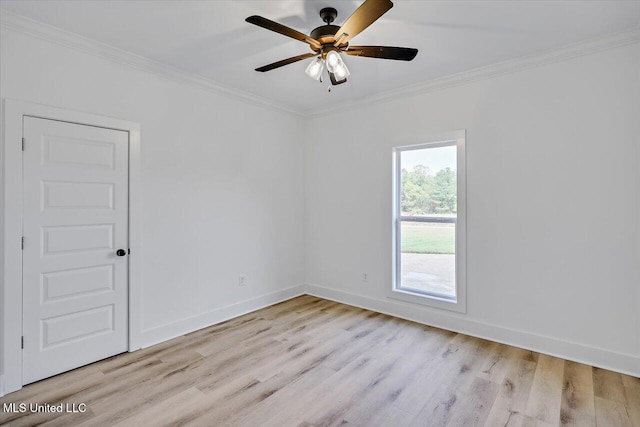 unfurnished room featuring ceiling fan, ornamental molding, and light wood-type flooring