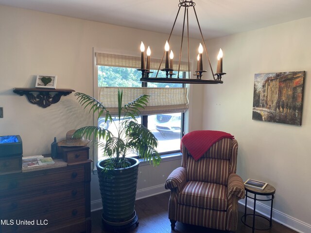 4858 Victoria Dr, Nesbit, MS 38651 - sitting room with wood finished floors, baseboards, and a chandelier