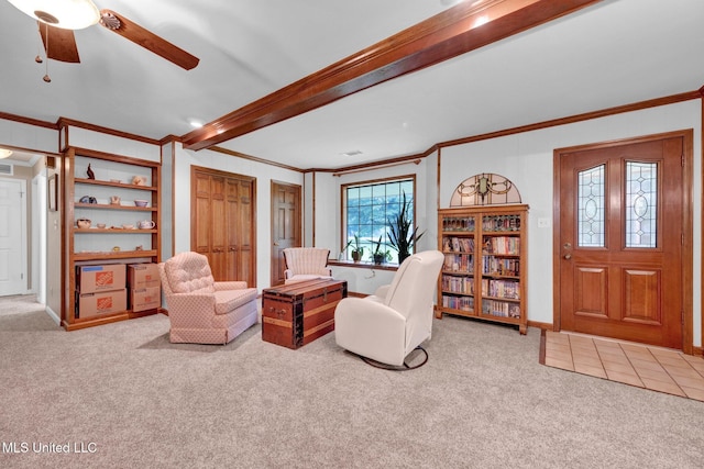 8140 Hunters Hill Cv, Olive Branch, MS 38654 - carpeted living room featuring crown molding, beam ceiling, ceiling fan, and baseboards