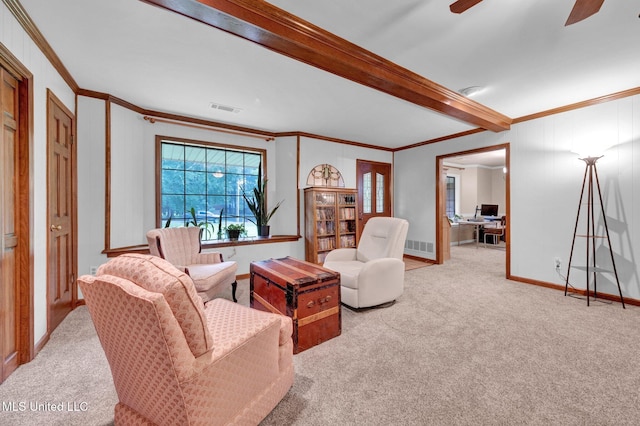 8140 Hunters Hill Cv, Olive Branch, MS 38654 - living room with ornamental molding, carpet flooring, beam ceiling, baseboards, and a ceiling fan