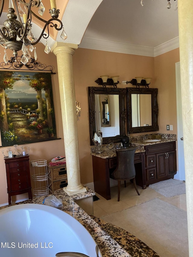 bathroom with crown molding, vanity, an inviting chandelier, tile patterned flooring, and decorative columns