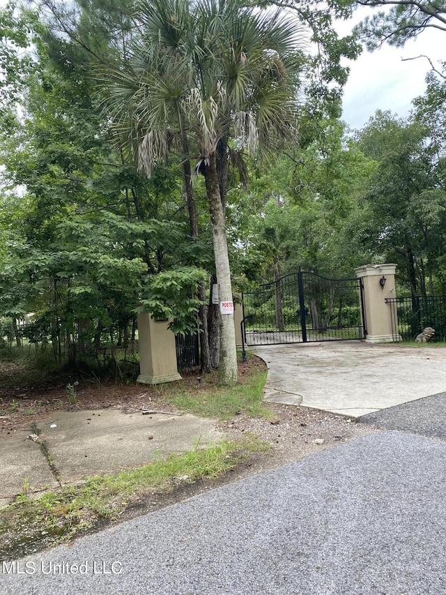 view of street featuring a gate