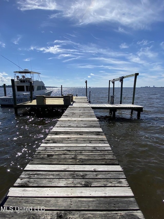 view of dock featuring a water view