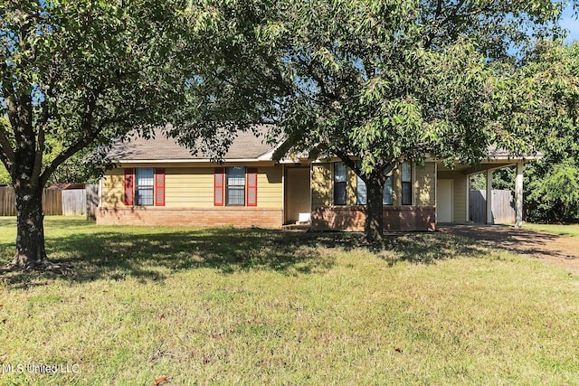 single story home featuring a front yard