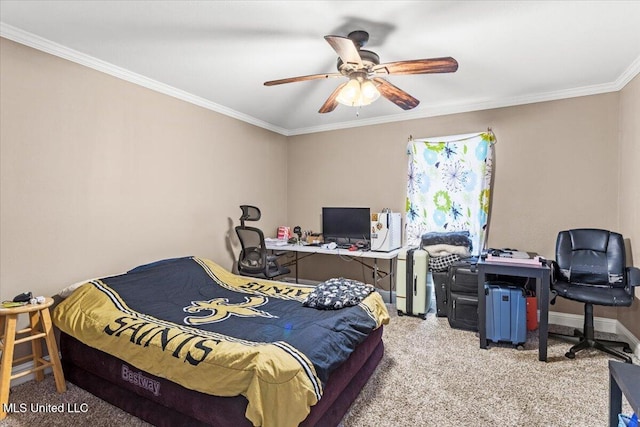 carpeted bedroom with a ceiling fan, baseboards, and crown molding