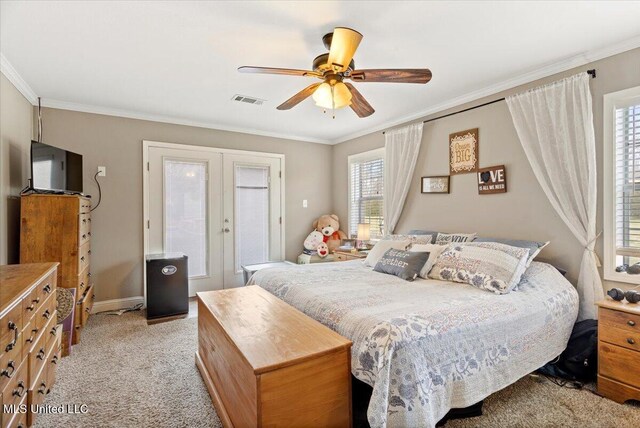 bedroom with visible vents, ornamental molding, and french doors