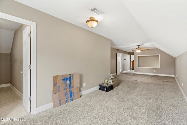 bonus room with vaulted ceiling, carpet flooring, visible vents, and baseboards