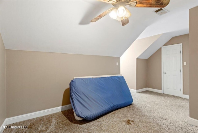 bonus room with lofted ceiling, baseboards, visible vents, and carpet flooring