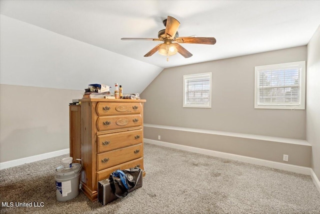 bonus room featuring lofted ceiling, ceiling fan, baseboards, and carpet flooring