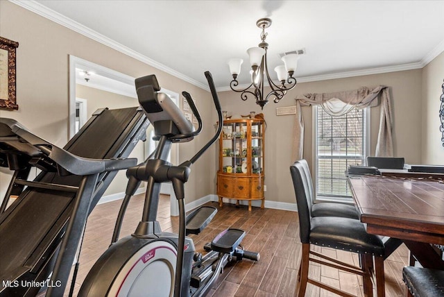 exercise area with a chandelier, dark wood-style flooring, visible vents, baseboards, and crown molding