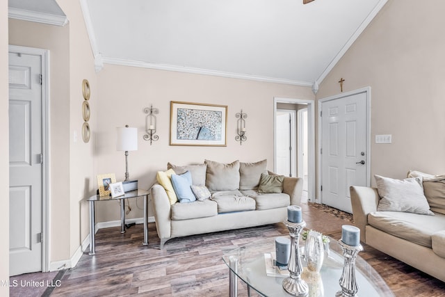 living room featuring crown molding, vaulted ceiling, and hardwood / wood-style flooring