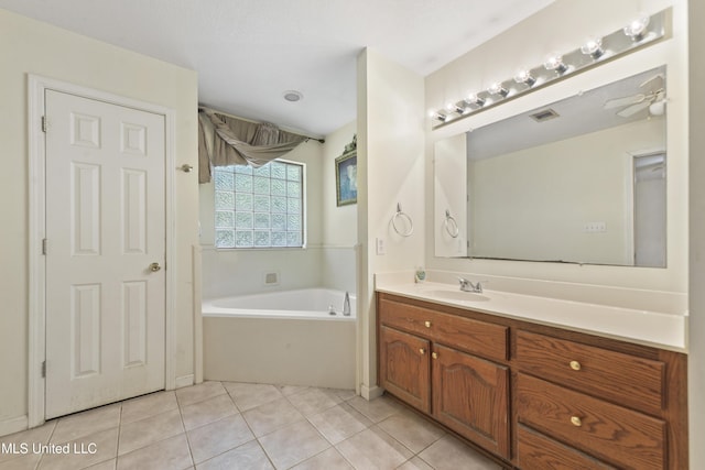 1317 Rosemont Dr, Gautier, MS 39553 - full bath with a bath, tile patterned flooring, vanity, and a ceiling fan
